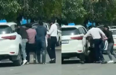 बदमाशों के हौसले बुलंद, बीच चौराहे युवक को कार से खींचकर लात-घूंसों से पीटा, Video वायरल