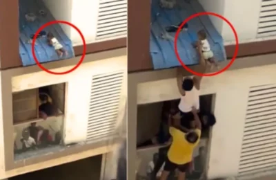 बालकनी के प्लास्टिक शीट पर लटका हुआ था बच्चा, लोगों ने अनोखे तरीके से मासूम की बचाई जान